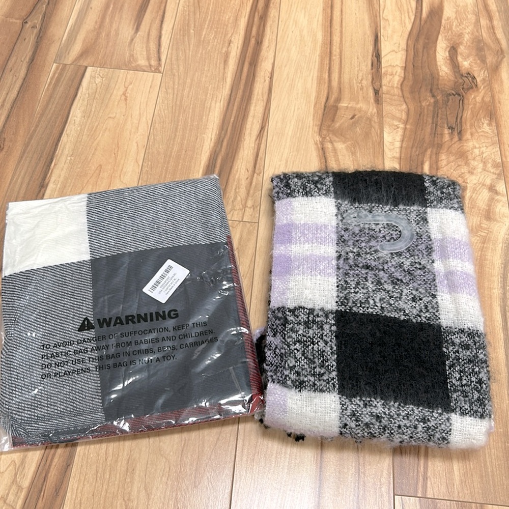 NWT two scarfs one in bag and one with plastic hanger no tags
